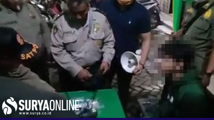 berita-tangkapan-layar-pemuda-berjaket-jumper-warna-hijau-saat-diinterogasi-aparat.jpg