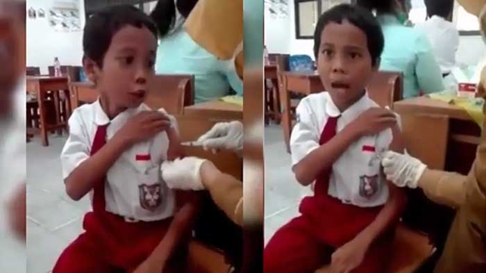 VIDEO : Bocah SD ini Tunjukkan Ekspresi Kocak Saat Diimunisasi di Sekolah, Ucapannya Bikin Ngakak!