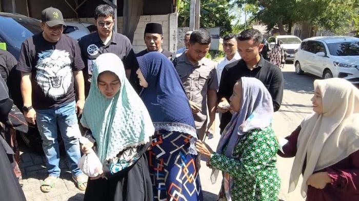 membagikan-13-ton-daging-kurban-ke-masyarakat-Kabupaten-Pasuruan.jpg