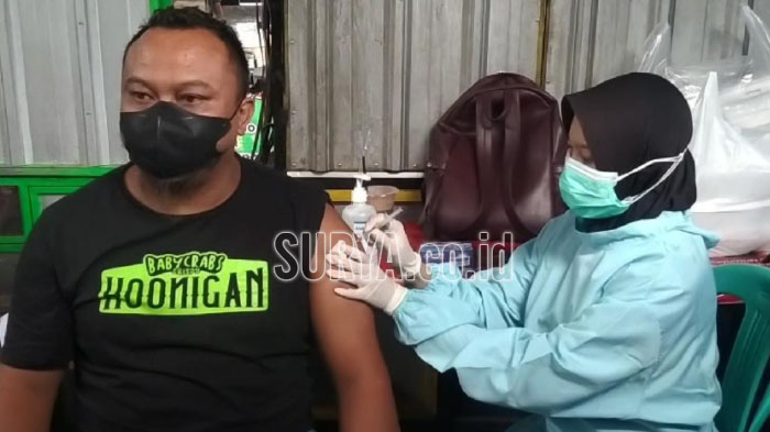 pedagangmenerima-vaksin-dosis-ketiga-untuk-90-persen-anggotanya.jpg