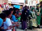 3-FAKTA-Video-Viral-Pengantin-Disambut-Sama-Lato-lato-Berawal-dari-Perlombaan-Ini-Kronologinya.jpg