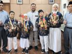 4-Siswa-SD-NU-1-Trate-Gresik-Ukir-Prestasi-Gemilang-di-Kejuaraan-Robotik-Internasional-Malaysia.jpg