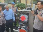BOBOL-ATM-Kapolres-Magetan-AKBP-Raden-Erik-Bangun-Prakasa-kanan.jpg