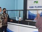 Direktur-PDAM-Lamongan-M-Ali-Mahfudi-mendampingi-Bupati-Yuhronur.jpg