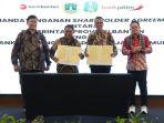 Direktur-Utama-Bank-Jatim-Busrul-Iman-dan-Pj-Gubernur-Banten-Al-Muktabar.jpg