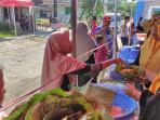 HUT-TNI-Anggota-Polres-Lamongan-Ipda-Purnomo-menggelar-kegiatan-sosial-sedekah.jpg