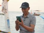 JARINGAN-HANDAL-Seorang-nelayan-saat-mencoba-jaringan-handal-y.jpg