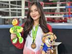 KICKBOXING-Marsha-Alycia-Rahmadiar-Setianto-saat-meraih-me.jpg