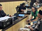 MELAPOR-Owner-Cafe-Asyiq-Muhammad-Asnawi-Sofyan-saat-men.jpg