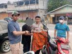 NASIB-AKHIR-Pria-Berseragam-Ormas-Palak-Sopir-Truk-KTA-nya-Diselidiki-Lagi-Ini-Ancaman-Hukumannya.jpg