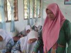Perjuangan-Rukiah-17-Tahun-Jadi-Guru-Honorer-di-Sumut-Kini-Bahagia-Lulus-Seleksi-PPPK-Kemenag.jpg