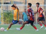 Perseba-Bangkalan-baju-merah-di-Stadion-Gelora-Bangkalan-beberapa-waktu-lalu.jpg