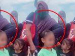 TAKTIK-LICIK-Perempuan-Berkerudung-Curi-Kalung-Beraksi-di-Keramaian-Dekati-Bocah-Tanpa-Pendamping.jpg