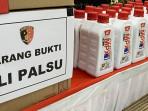 WASPADA-OLI-PALSU-Ilustrasi-oli-palsu-Kepala-Bengke.jpg