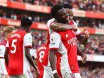 bukayo-saka-saat-merayakan-golnya-di-laga-arsenal-vs-tottenham.jpg