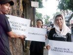 gerakan-untuk-Sidoarjo-Baik-itu-melakukan-bersih-bersih-paku-yang-menancap-di-pohon.jpg