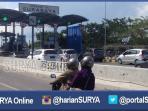 gerbang-tol-jembatan-suramadu-sisi-surabaya_20160709_133132.jpg