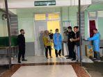identifikasi-terhadap-bungkusan-yang-diduga-berisi-kaki-Uswatun-korban.jpg