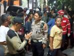olah-TKP-kasus-bocah-meninggal-tertabrak-mobil-listrik-di-Surabaya.jpg