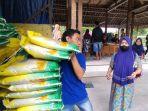 operasi-pasar-beras-murah-yang-digelar-Pemkab-Madiun-di-Desa-Sumberejo.jpg