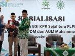 paling-kiri-Area-Manager-BSI-Area-Surabaya-Raya-Yurri-Leonardi.jpg