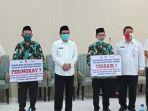 plt-bupati-jember-memberikan-penghargaan-kepada-dua-kafilah-mtq.jpg