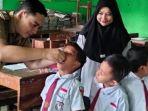 vaksinasi-polio-anak-SD-di-Nganjuk.jpg