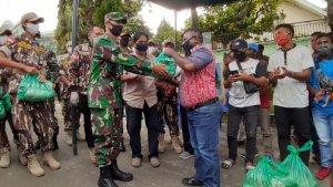 bantuan-mahasiswa-papua-kota-malang.jpg