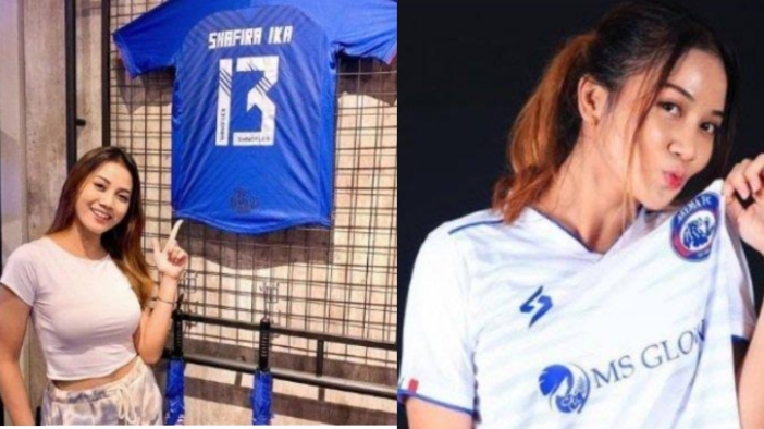 pemain-arema-fc-putri-shafira-ika-berpose-bersama-jersey-arema-fc.jpg