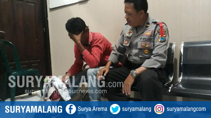 pemuda-asal-kediri-agung-saputro-setelah-ditangkap-anggota-polsek-manyar-gresik_20180322_140420.jpg