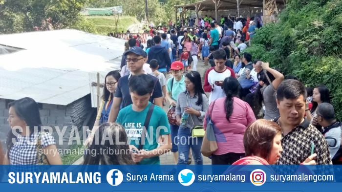 pengunjung-coban-rais-di-kota-batu-membludak-untuk-menikmati-lebaran_20170702_122812.jpg