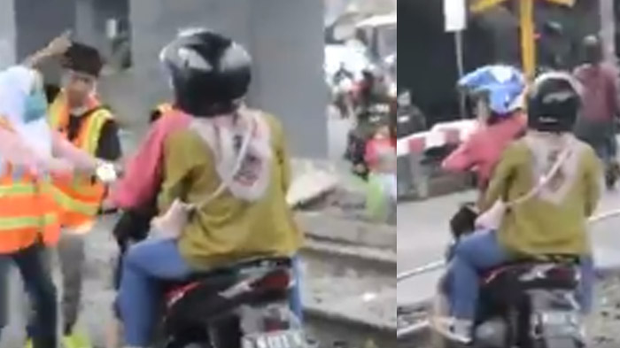 Pria Bonceng Anak & Istri Nekat Terobos Palang Kereta Api, Geger sama Petugas saat Kereta Mau Lewat