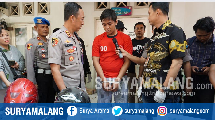 tersangka-begal-sadis-noval-setelah-ditangkap-anggota-polrestabes-surabaya.jpg