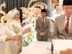 3-Momen-Menarik-Jokowi-di-Pernikahan-Wali-Kota-Tegal-Dedy-Yon-Tahan-Tawa-Lihat-Tepuk-Sakinah.jpg