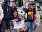 Aremania-asal-Sidoarjo-Muhammad-Anugrah-Bustom-yang-mengikuti-aksi-damai-40-hari-Tragedi-Kanjuruhan.jpg