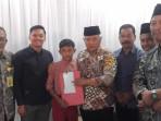 Bupati-Malang-Muhammad-Sanusi-saat-menerima-rombongan-Muhammad-Nazarullah.jpg