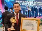 Eko-Jarwanto-saat-menerima-penghargaan-10-besar-kategori.jpg