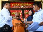KBO-Satreskrim-Polres-Malang-Iptu-Ahmad-Taufik-dan-suami-jual-istri-di-Polres-Malang.jpg