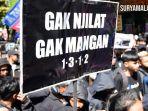 KECAM-PENJILAT-Ratusan-suporter-Arema-FC-Aremania.jpg