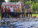 Polres-Malang-beserta-Bupati-dan-Forkopimda-Kabupaten-Malang-memusnahkan-ribuan-miras.jpg
