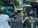 Viral-di-media-sosial-pengendara-sepeda-motor-memukul-driver-ojek-online.jpg