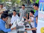 Warga-mengurus-Administrasi-Kependudukan-Dispendukcapil-Kota-Malang.jpg