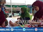 aktivitas-kampung-payung-di-kelurahan-pandangwangi-kecamatan-blimbing-kota-malang_20171029_202157.jpg