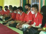 anak-yatim-piatu-sman-1-driyorejo-doakan-timnas-indonesia.jpg