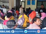 antrean-warga-dalam-mengurus-adminduk-di-kantor-layanan-dispendukcapil-kabupaten-malang_20180603_171125.jpg