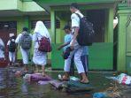 banjir-masih-menggenangi-kompleks-smpn-2-tanggulangin-sidoarjo.jpg