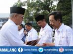 bupati-malang-h-rendra-kresna-menyerahkan-sk-pensiun-kepada-asn_20180808_193100.jpg