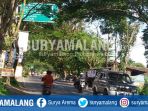 dahan-pohon-yang-menutupi-rambu-penunjuk-jalan-di-kepanjen-kabupaten-malang_20180227_174404.jpg