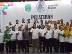 direktur-bank-mandiri-taspen-iwan-soeroto-kepala-pt-taspen-persero-cabang-malang.jpg