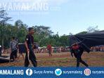 kesenian-bantengan-di-lapangan-desa-jambuwer-kecamatan-kromengan-kabupaten-malang.jpg